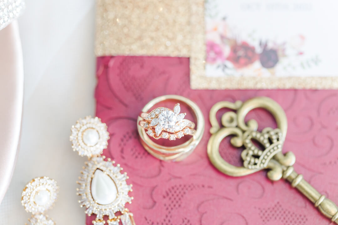 Bridal details of rings and earrings loft 1023 wedding